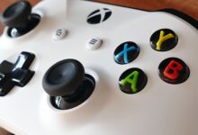 Close-up image of an Xbox controller highlighting buttons and joysticks.