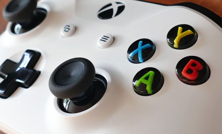 Close-up image of an Xbox controller highlighting buttons and joysticks.