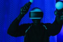 Person enjoying a virtual reality gaming session with a VR headset and controllers.