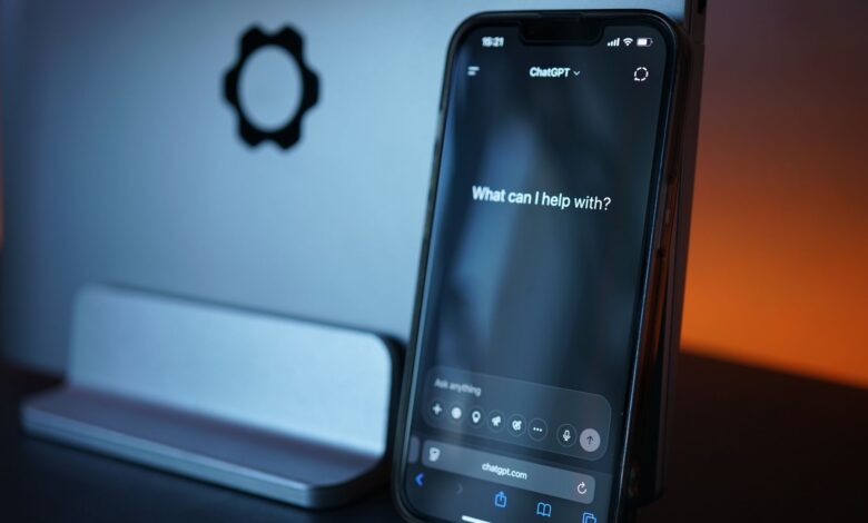 Close-up of a smartphone with AI chat interface, showcasing advanced technology in a sleek design.