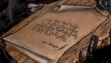 High angle of old lacquered woodwork with image of parchment and old inscriptions
