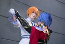 Dynamic cosplay scene with characters in vibrant outfits showcasing dramatic interaction.