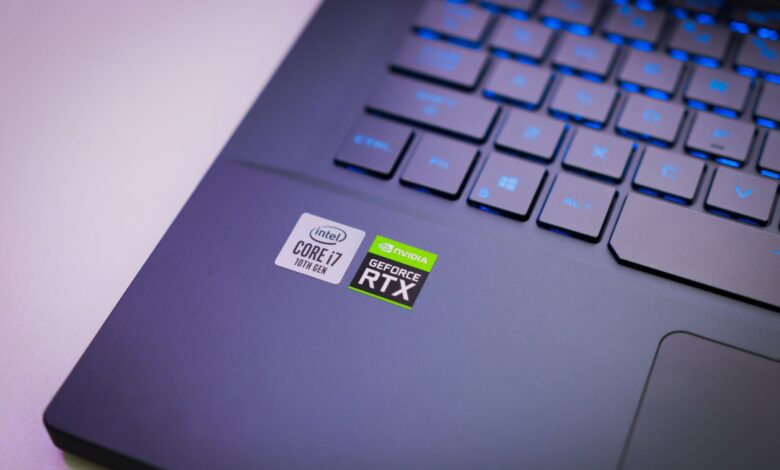Laptop keyboard with Intel Core i7 and NVIDIA GeForce RTX stickers, symbolizing high-performance computing power.