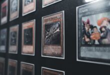 A close-up view of Yu-Gi-Oh! trading cards in a display case showcasing rare and collectible cards.