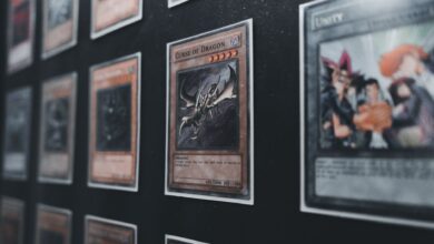A close-up view of Yu-Gi-Oh! trading cards in a display case showcasing rare and collectible cards.