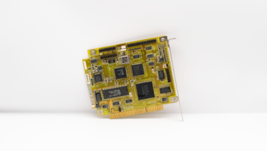 Antique circuit board showcasing vintage computing technology, isolated on a white background.
