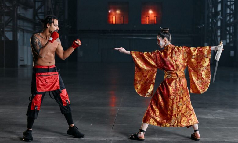 A dynamic scene of a boxer facing a samurai in traditional attire in an industrial space.