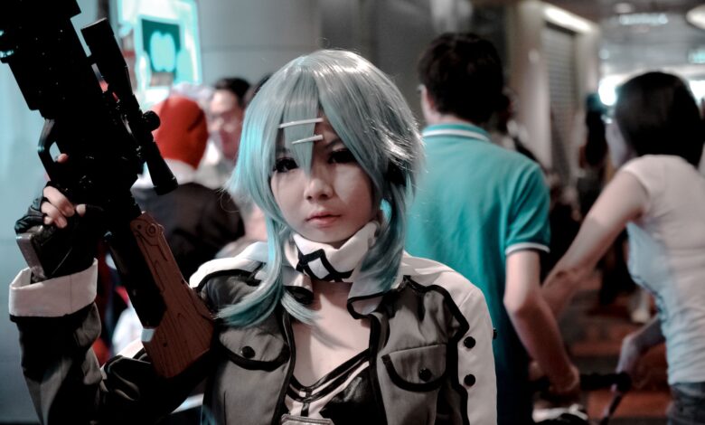 Vibrant cosplay participant posing indoors at a bustling convention scene.
