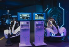 Futuristic gaming chairs with VR headsets and monitors, capturing immersive gameplay in a modern arcade.