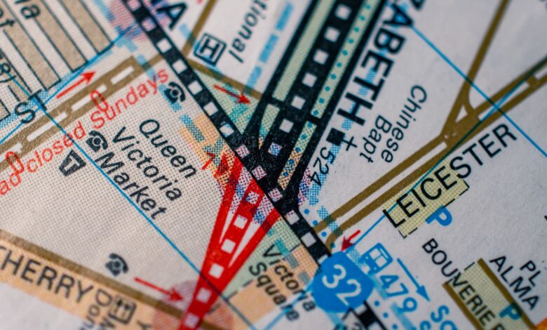 Detailed close-up of Melbourne map highlighting Queen Victoria Market and other landmarks in vivid colors.