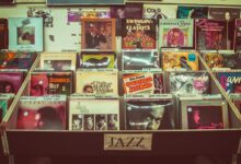 A collection of vintage jazz vinyl records displayed at a music store evoking nostalgia and retro charm.