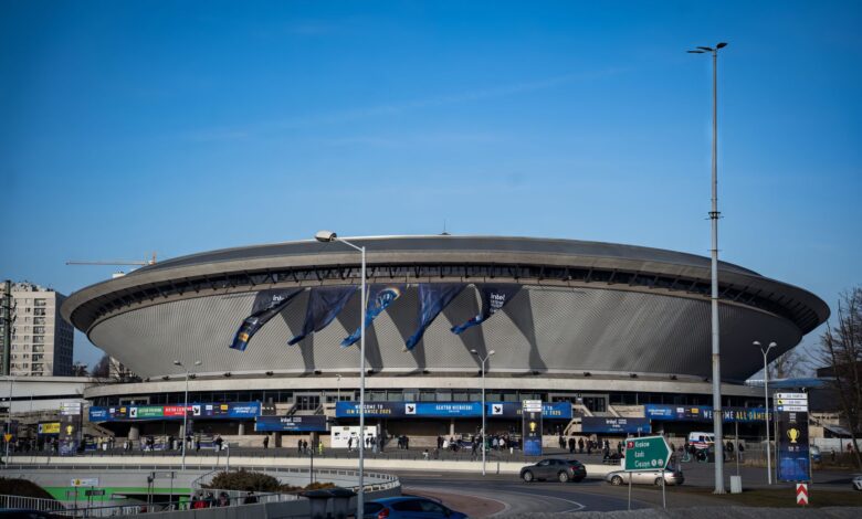 Spodek Arena in Katowice featuring a vibrant esports event atmosphere with banners.
