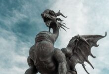 Bronze dragon statue with wings and detailed features in Kazan, Russia.