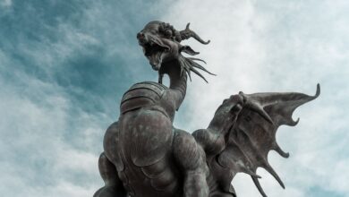 Bronze dragon statue with wings and detailed features in Kazan, Russia.
