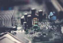 Detailed close-up of a motherboard showcasing electronic components and circuits.