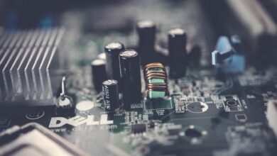 Detailed close-up of a motherboard showcasing electronic components and circuits.