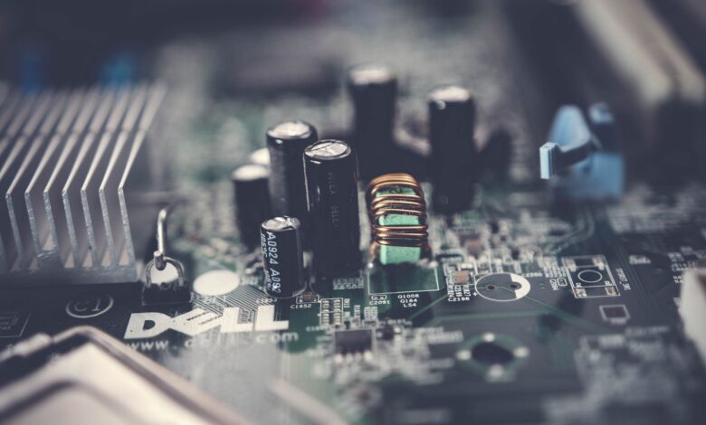 Detailed close-up of a motherboard showcasing electronic components and circuits.