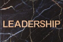 Leadership text on a striking dark marble surface, symbolizing strength.