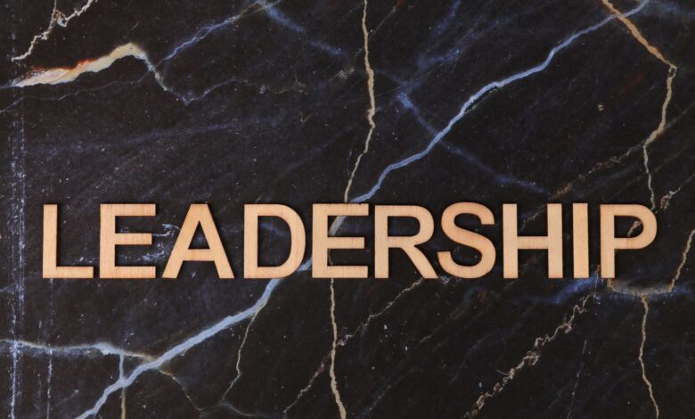 Leadership text on a striking dark marble surface, symbolizing strength.