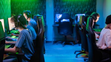 A vibrant gaming scene with a focused esports team immersed in intense gameplay.