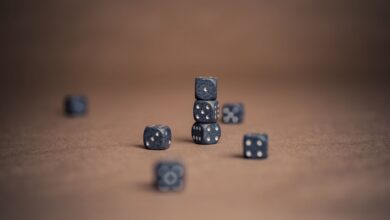 Artistic display of stacked dice showcasing luck and chance in a minimalist composition.