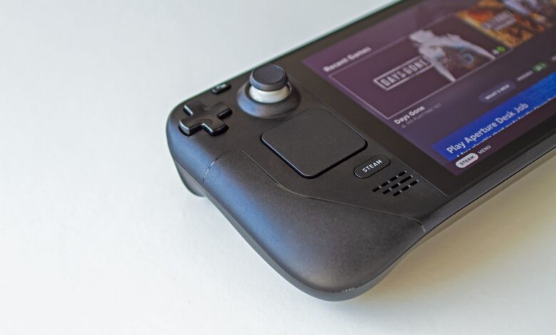 Detailed view of a handheld gaming console showcasing game selection on its screen.