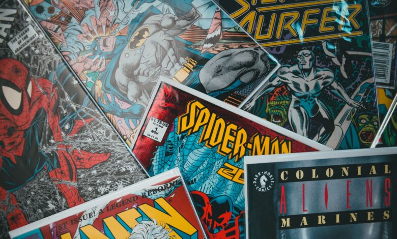 From above closeup of collection of assorted creative comic magazines with colorful illustrations spread out on surface