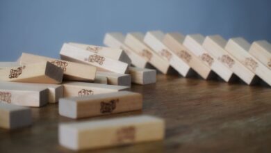 Board game with wooden blocks dropped and scattered on table chaotically after playing