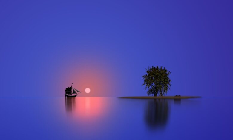 Serene view of a sailboat and island tree reflecting at sunset.