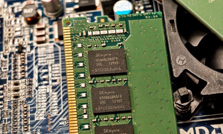 Detailed view of RAM and circuit board components in a computer setup.